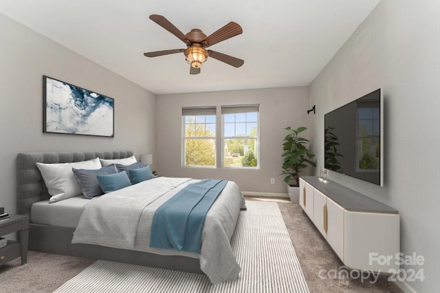 bedroom featuring ceiling fan and carpet flooring