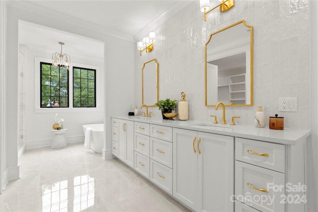 bathroom with tile floors, crown molding, double vanity, and tile walls