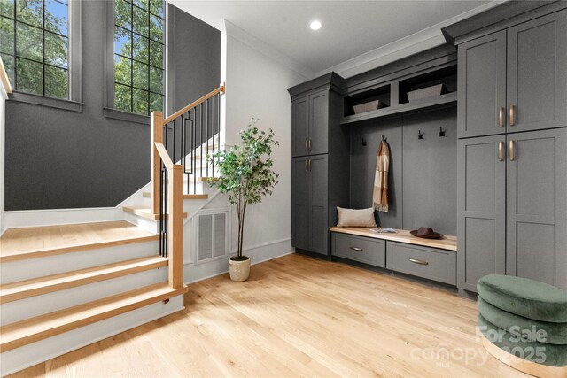4142 Pineview Rd, Charlotte, NC 28211 - mudroom with light wood-type flooring, crown molding, recessed lighting, and baseboards