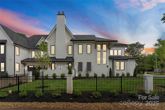 4142 Pineview Rd, Charlotte, NC 28211 - view of front facade with a chimney and roof with shingles