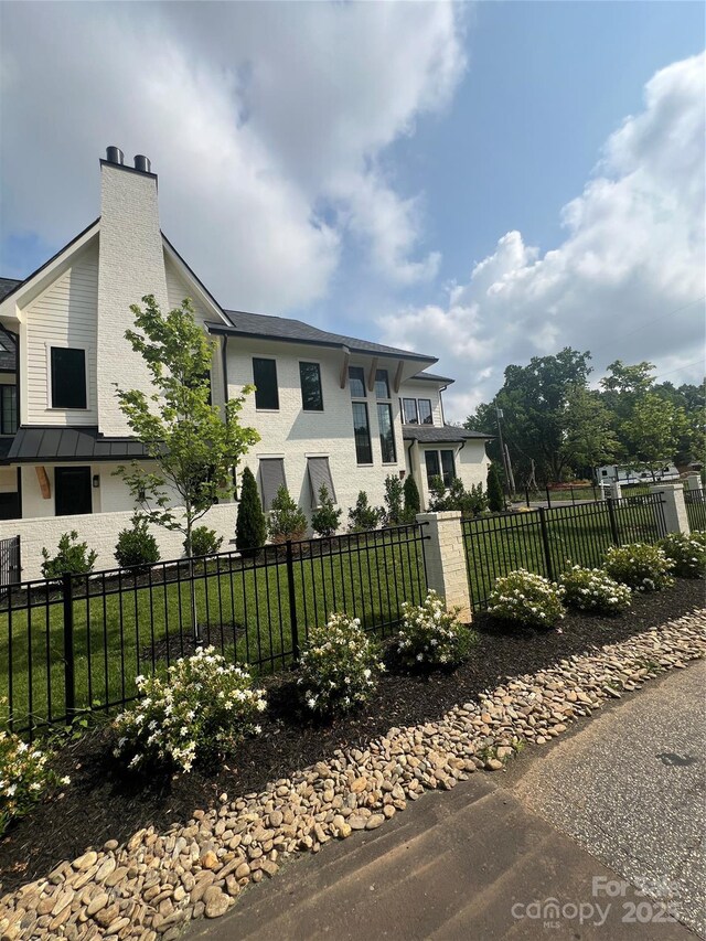 4142 Pineview Rd, Charlotte, NC 28211 - view of front of property with a chimney