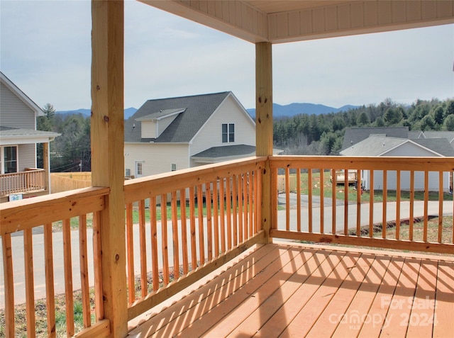 wooden terrace with a mountain view