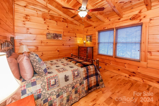 bedroom featuring wood ceiling, lofted ceiling with beams, ceiling fan, and light wood-type flooring