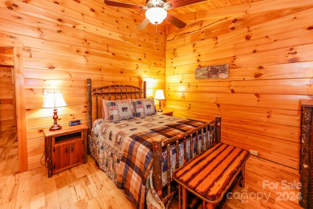 bedroom featuring ceiling fan, wooden ceiling, and light wood-type flooring