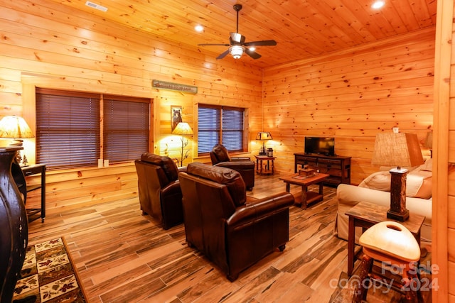 living room with wooden ceiling, light hardwood / wood-style floors, and ceiling fan