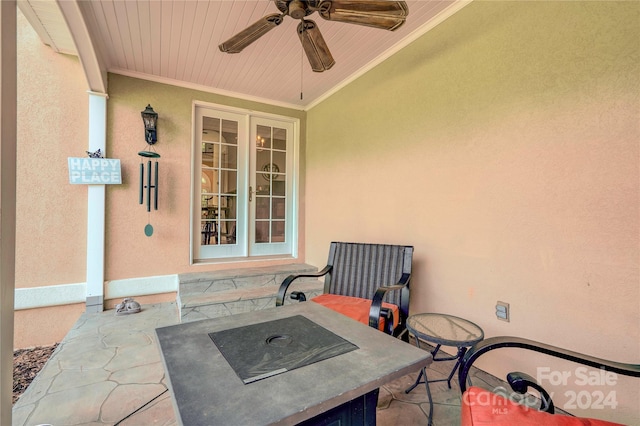 view of patio featuring ceiling fan