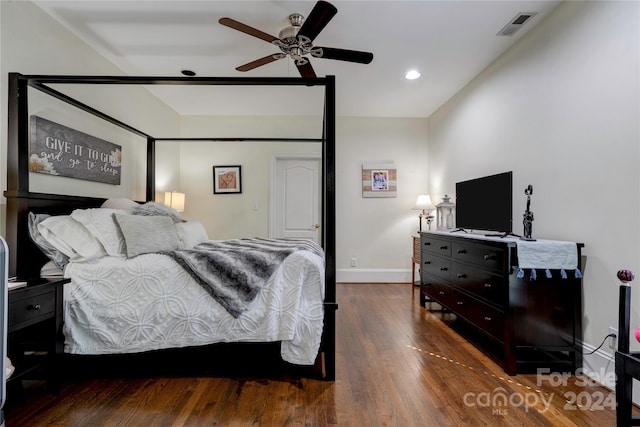 bedroom featuring dark hardwood / wood-style flooring and ceiling fan