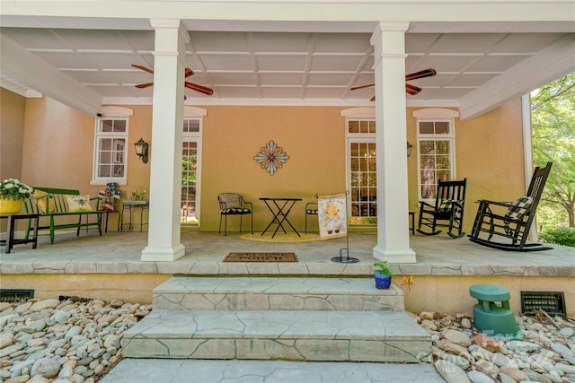 view of patio / terrace with ceiling fan and a porch