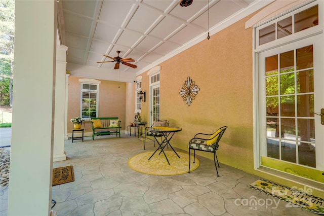 view of patio featuring ceiling fan and covered porch