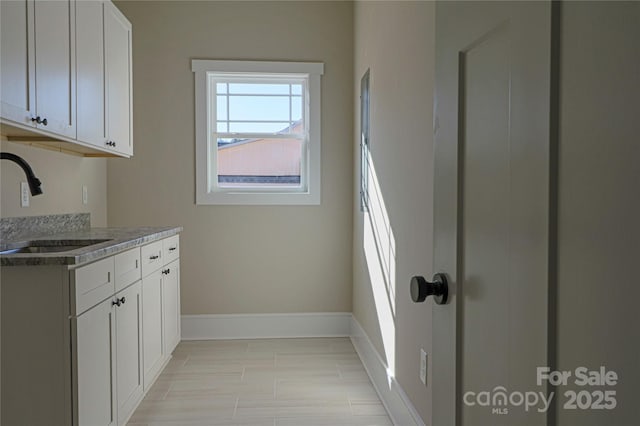 laundry room featuring sink