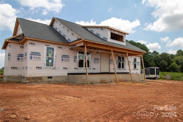 back of house with a porch