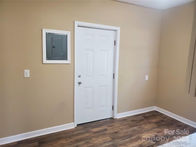 spare room featuring dark hardwood / wood-style floors