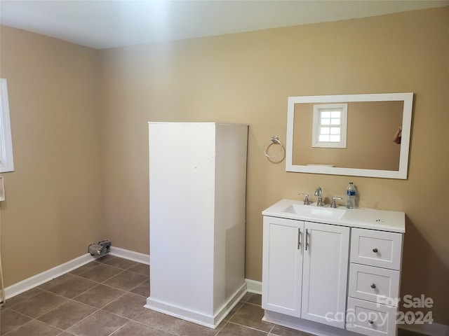 bathroom featuring vanity and tile floors