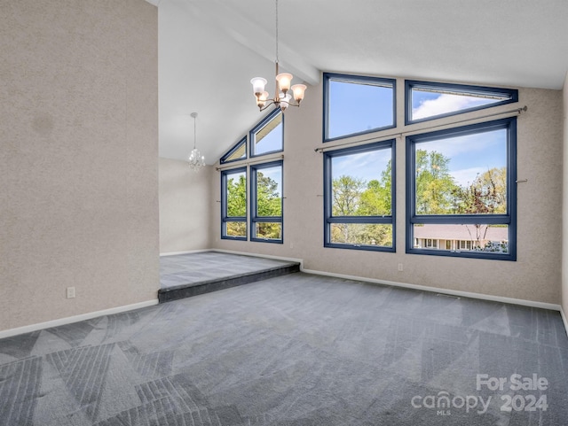 carpeted empty room featuring a chandelier, high vaulted ceiling, and beamed ceiling