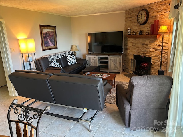 tiled living room with a stone fireplace and a textured ceiling