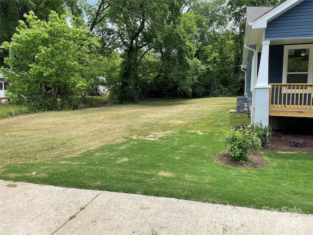 view of yard with central AC