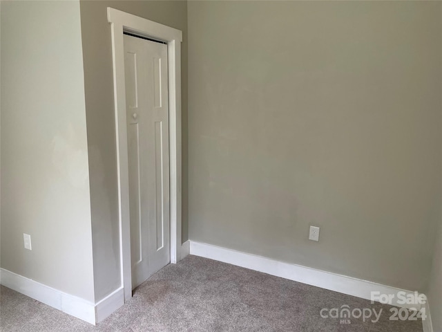 empty room featuring carpet