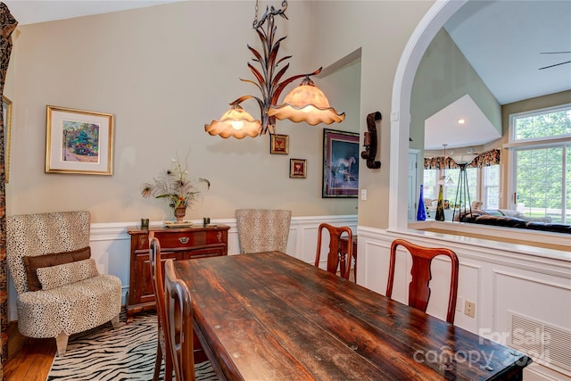 dining space with hardwood / wood-style flooring