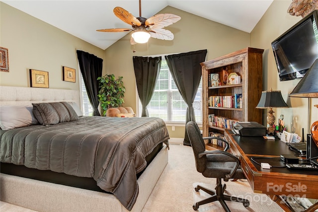 bedroom featuring ceiling fan, light carpet, and vaulted ceiling