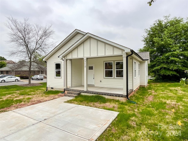 bungalow-style home with a porch