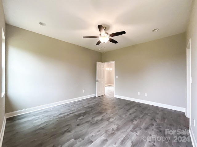 unfurnished room with wood-type flooring and ceiling fan