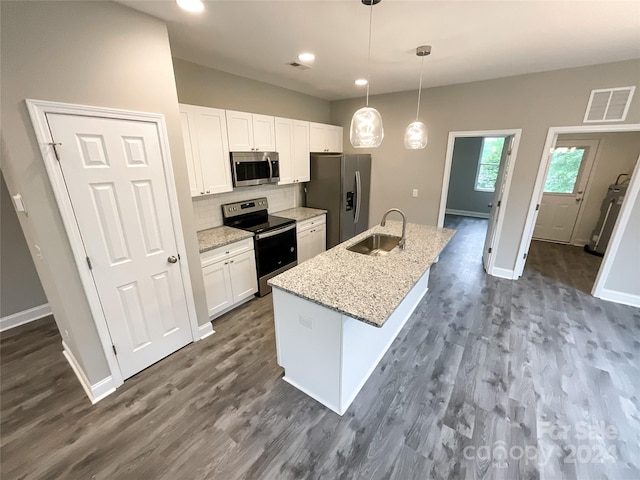 kitchen with sink, white cabinetry, stainless steel appliances, and dark hardwood / wood-style floors