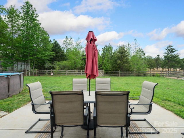 view of patio / terrace featuring a rural view