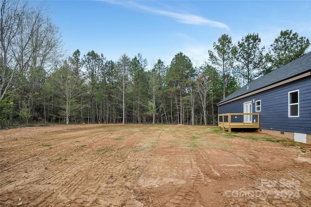 view of yard with a deck