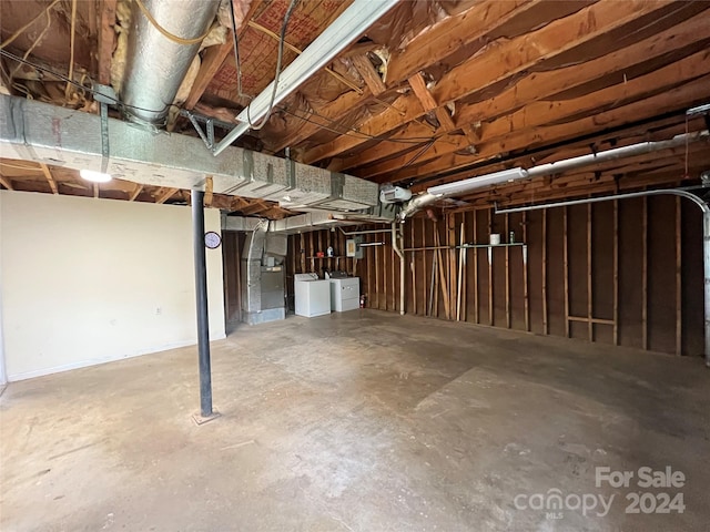 basement featuring washer and dryer