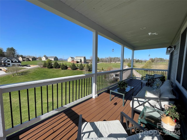 deck featuring a lawn