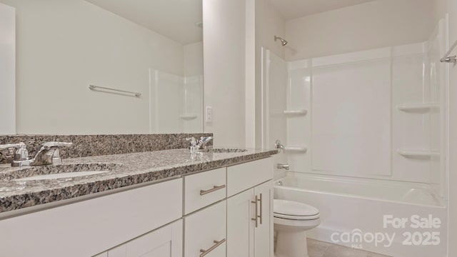 full bathroom with tile patterned flooring, vanity, bathtub / shower combination, and toilet