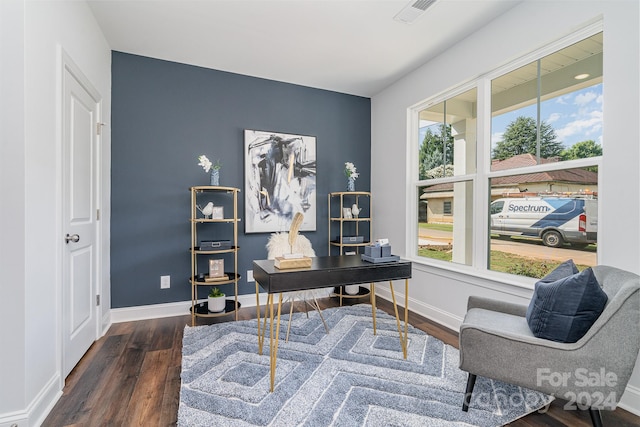 home office with dark hardwood / wood-style flooring