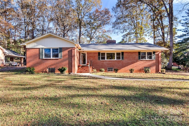 ranch-style house with a front yard