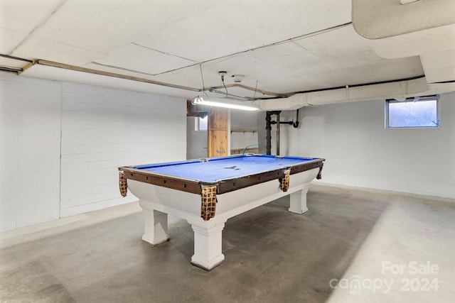 game room with concrete flooring and billiards