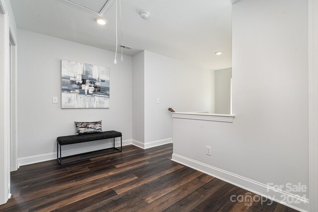 interior space with dark hardwood / wood-style flooring