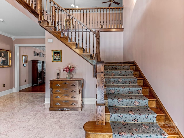 staircase with crown molding