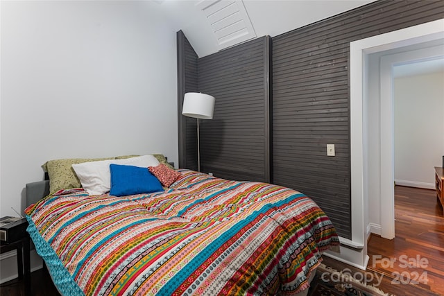 bedroom featuring dark hardwood / wood-style floors