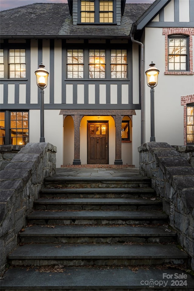 property entrance featuring covered porch