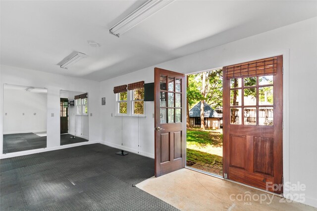 30 Cedarcliff Rd, Asheville, NC 28803 - carpeted entryway with baseboards