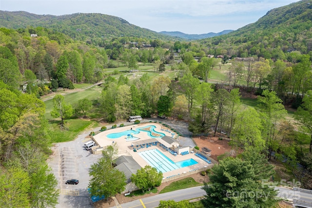 birds eye view of property featuring a mountain view