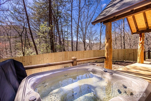 view of pool featuring a hot tub