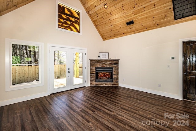 unfurnished living room with wood ceiling, high vaulted ceiling, dark hardwood / wood-style flooring, and french doors