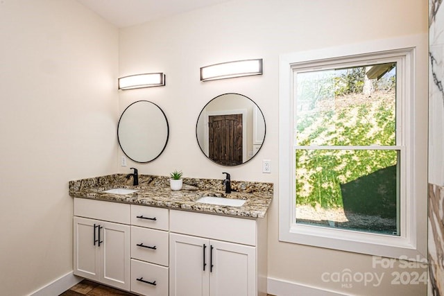 bathroom with double sink vanity