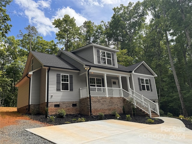 view of front of home featuring covered porch