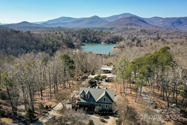 bird's eye view featuring a water and mountain view