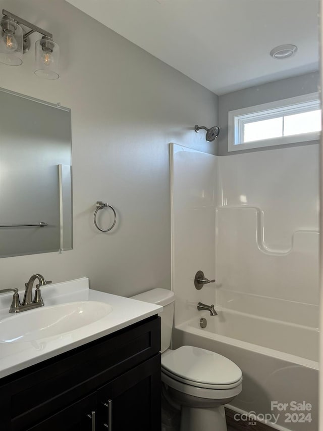 full bathroom featuring vanity, toilet, and shower / bath combination