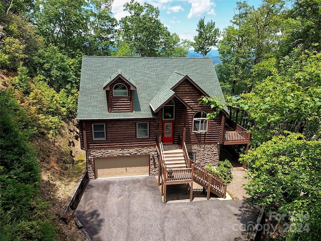 cabin featuring a garage