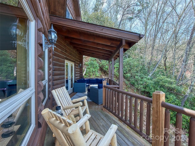 deck featuring an outdoor living space