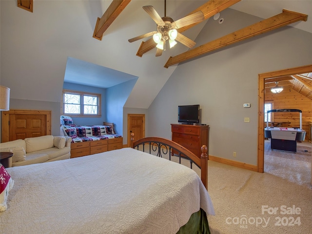 bedroom featuring ceiling fan, lofted ceiling with beams, and light carpet