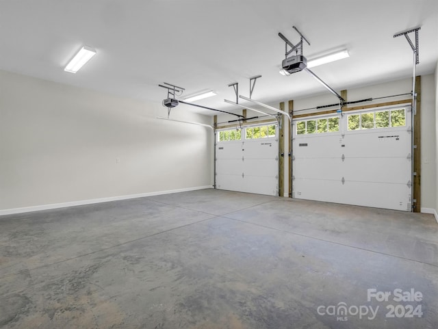 garage featuring a garage door opener